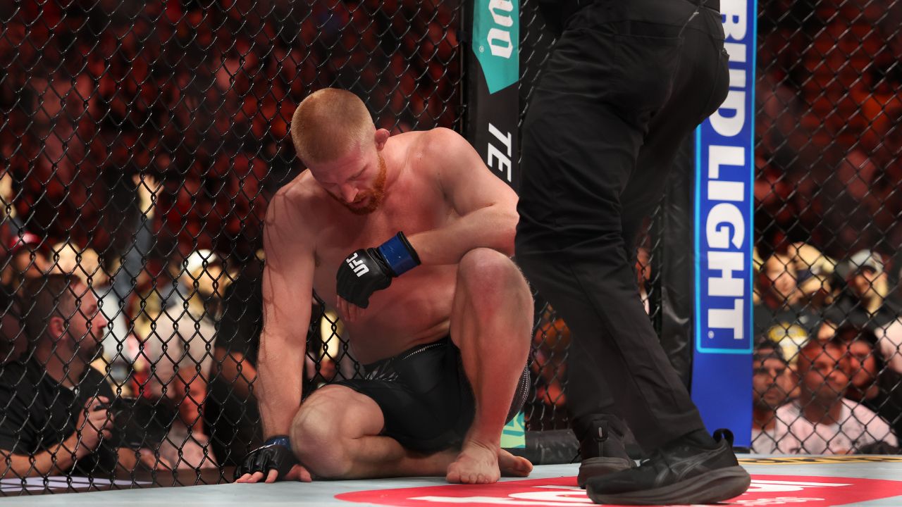 Bo Nickal (blue gloves) reacts after losing to Reinier de Ridder (not pictured) during UFC Fight Night at Wells Fargo Arena.