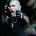 Alex Pereira (red gloves) prepares to fight Magomed Ankalaev (not pictured) during UFC 313 at T-Mobile Arena.