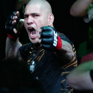 Alex Pereira (red gloves) prepares to fight Magomed Ankalaev (not pictured) during UFC 313 at T-Mobile Arena.