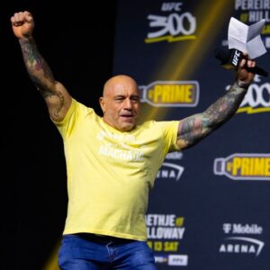 UFC announcer Joe Rogan reacts during ceremonial weigh ins for UFC 300 at MGM Grand Garden Arena.