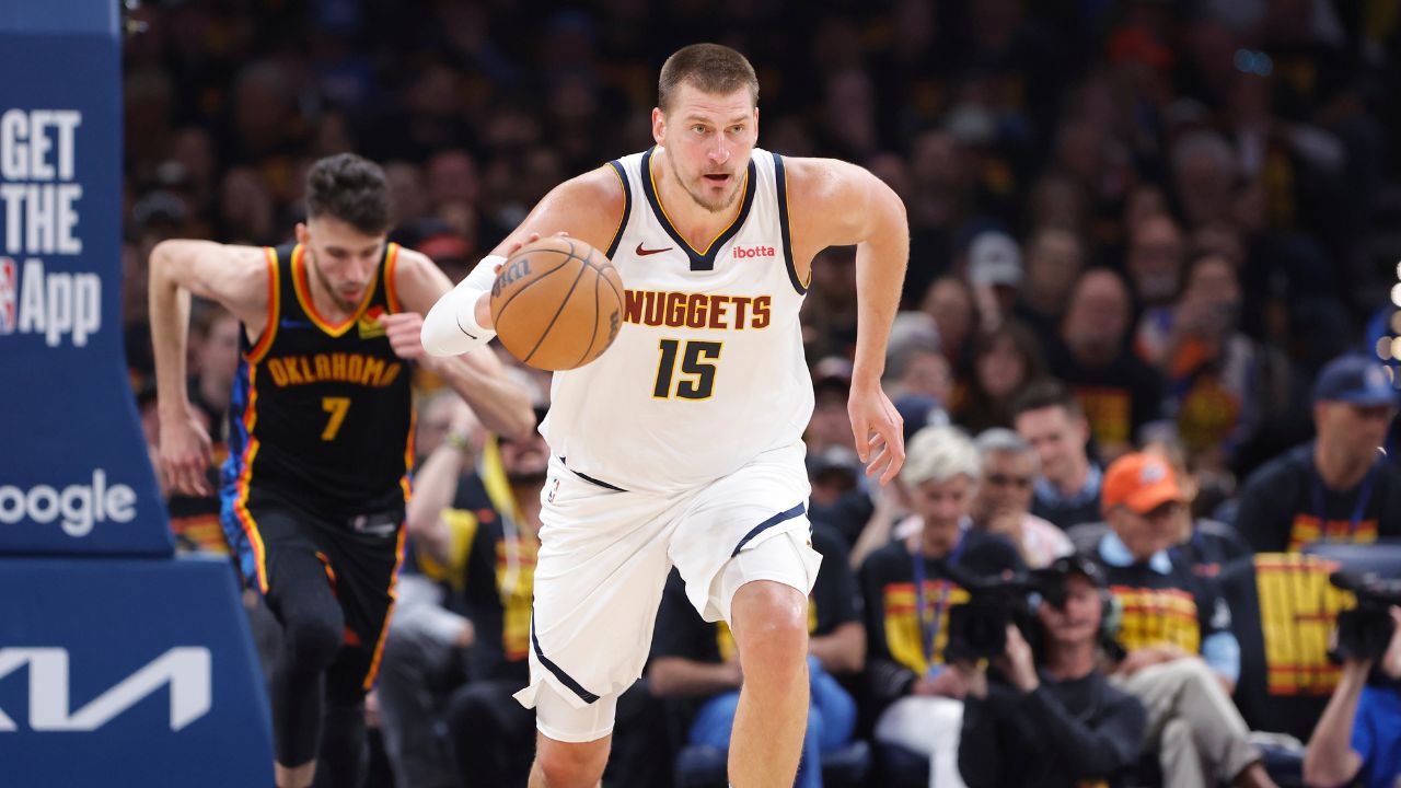 Denver Nuggets center Nikola Jokic (15) dribbles against the Oklahoma City Thunder during the second quarter during game one of the second round for the 2025 NBA Playoffs at Paycom Center.