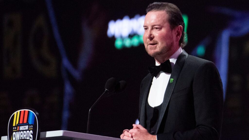 Retired NASCAR Cup Series driver Kurt Busch speaks onstage at the 2023 NASCAR Awards Banquet at the Music City Center in Nashville, Tenn., Thursday, Nov. 30, 2023.
