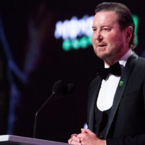Retired NASCAR Cup Series driver Kurt Busch speaks onstage at the 2023 NASCAR Awards Banquet at the Music City Center in Nashville, Tenn., Thursday, Nov. 30, 2023.