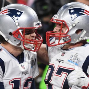 Feb 4, 2018; Minneapolis, MN, USA; New England Patriots tight end Rob Gronkowski (87) celebrates with Patriots quarterback Tom Brady (12) after scoring a touchdown against the Philadelphia Eagles during the fourth quarter in Super Bowl LII at U.S. Bank Stadium.