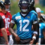 Jacksonville Jaguars wide receiver Travis Hunter (12) walks to his lane during the first organized team activity at Miller Electric Center Monday, May 19, 2025 in Jacksonville, Fla.