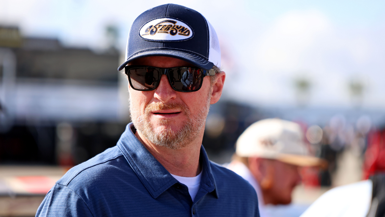 NASCAR team owner Dale Earnhardt Jr. looks on during practice for the Daytona 500 at Daytona International Speedway.