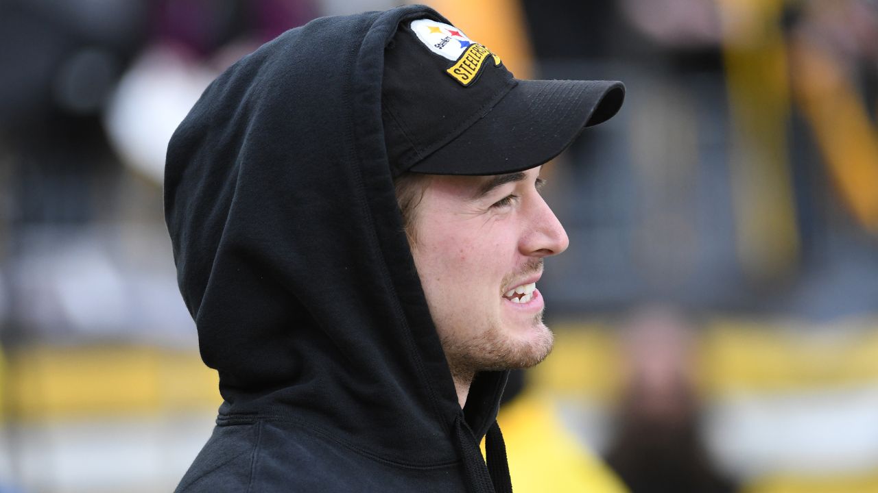 Pittsburgh Steelers quarterback Kenny Pickett (8) watches from the sidelines before a game against the Cincinnati Bengals at Acrisure Stadium.