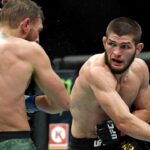 Khabib Nurmagomedov (red gloves) fights Conor McGregor (blue gloves) during UFC 229 at T-Mobile Arena.