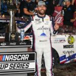 NASCAR Cup Series driver Ross Chastain (1) celebrates his win during the Coca Cola 600 at Charlotte Motor Speedway.