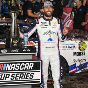 NASCAR Cup Series driver Ross Chastain (1) celebrates his win during the Coca Cola 600 at Charlotte Motor Speedway.