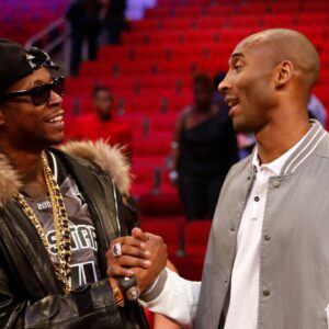 Feb 16, 2013; Houston, TX, USA; Recording artist 2 Chainz (left) greets Los Angeles Lakers player Kobe Bryant after the 2013 NBA all star slam dunk contest at the Toyota Center. Mandatory Credit: Brett Davis-Imagn Images