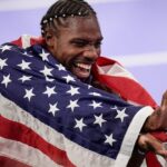 Noah Lyles (USA) celebrates after winning the men’s 100m final during the Paris 2024 Olympic Summer Games at Stade de France in Saint-Denis, France, Sunday, Aug. 4, 2024.