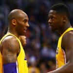 Los Angeles Lakers guard Kobe Bryant (left) and forward Julius Randle against the Phoenix Suns at Talking Stick Resort Arena. The Suns defeated the Lakers 119-107.