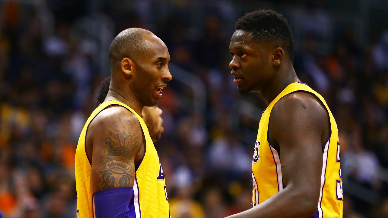 Los Angeles Lakers guard Kobe Bryant (left) and forward Julius Randle against the Phoenix Suns at Talking Stick Resort Arena. The Suns defeated the Lakers 119-107.