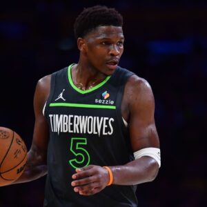 Minnesota Timberwolves guard Anthony Edwards (5) moves the ball against the Los Angeles Lakers during the second half in game five of first round for the 2025 NBA Playoffs at Crypto.com Arena.