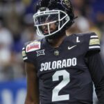 Colorado Buffaloes quarterback Shedeur Sanders (2) warms up before the game against the Brigham Young Cougars at Alamodome.