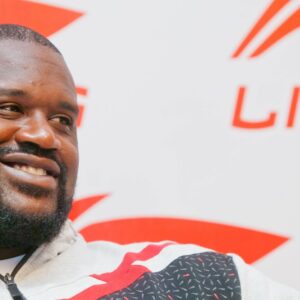 Former NBA Basketball Herren USA superstar Shaquille ONeal smiles during a promotional event by Chinese sportswear brand Li-Ning in Kunming, southwest Chinas Yunnan province, 20 October 2011.