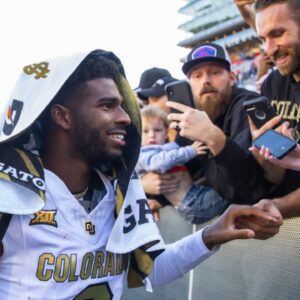 Colorado Buffalos quarterback Shedeur Sanders (2) greets fans after defeating the Arizona Wildcats at Arizona Stadium.