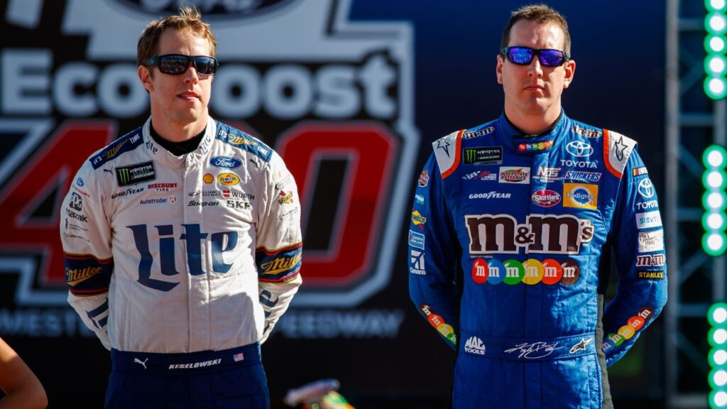 NASCAR drivers Brad Keselowski (left) and Kyle Busch prior to the Ford EcoBoost 400 at Homestead-Miami Speedway.
