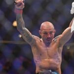 May 10, 2025; Montreal, Quebec, CANADA; Jose Aldo (red gloves) reacts after a fight with Aiemann Zahabi (not pictured) during UFC 315 at Bell Centre.