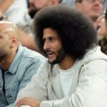 Former NFL player Colin Kaepernick looks on during the first half between the United States and Serbia in a men's basketball semifinal game during the Paris 2024 Olympic Summer Games at Accor Arena.