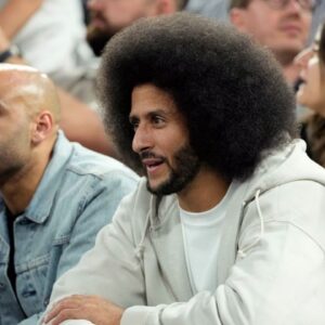 Former NFL player Colin Kaepernick looks on during the first half between the United States and Serbia in a men's basketball semifinal game during the Paris 2024 Olympic Summer Games at Accor Arena.