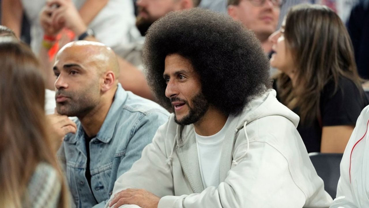 Former NFL player Colin Kaepernick looks on during the first half between the United States and Serbia in a men's basketball semifinal game during the Paris 2024 Olympic Summer Games at Accor Arena.