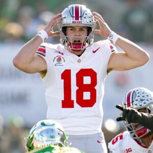 Ohio State Buckeyes quarterback Will Howard (18) motions at the line of scrimmage during the College Football Playoff quarterfinal against the Oregon Ducks at the Rose Bowl in Pasadena, Calif. on Jan. 1, 2025. Ohio State won 41-21.
