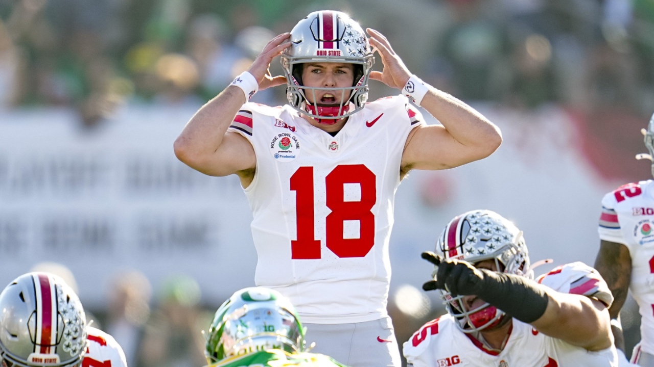 Ohio State Buckeyes quarterback Will Howard (18) motions at the line of scrimmage during the College Football Playoff quarterfinal against the Oregon Ducks at the Rose Bowl in Pasadena, Calif. on Jan. 1, 2025. Ohio State won 41-21.
