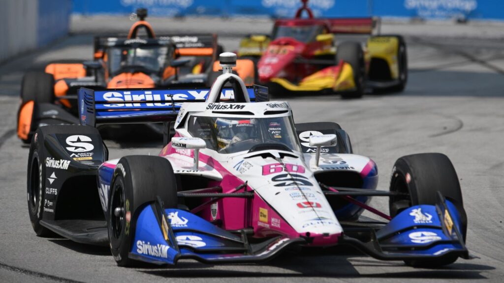 Meyer Shank Racing driver Felix Rosenqvist (60) leads a group of cars into turn nine during the Honda Dealers Indy at Streets of Toronto.