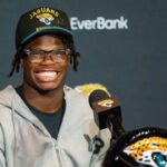 The Jacksonville Jaguars’ first-round pick, Colorado Buffaloes wide receiver and defensive back Travis Hunter, flashes his wide smile during a press conference Friday, March 25, 2025 at Miller Electric Center in Jacksonville, Fla.