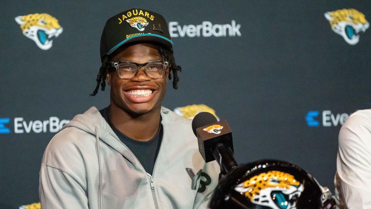 The Jacksonville Jaguars’ first-round pick, Colorado Buffaloes wide receiver and defensive back Travis Hunter, flashes his wide smile during a press conference Friday, March 25, 2025 at Miller Electric Center in Jacksonville, Fla.
