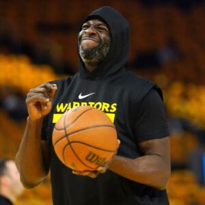 Golden State Warriors forward Draymond Green (23) holds onto the ball during warmups against the Minnesota Timberwolves during game four of the second round for the 2025 NBA Playoffs at Chase Center.