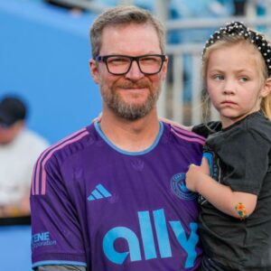 Coronation guest Dale Earnhardt Jr. with his daughter Isla Rose during pregame warm ups between the Charlotte FC and the Colorado Rapids at Bank of America Stadium.