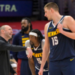 Denver Nuggets assistant coach David Adelman talks with guard Kentavious Caldwell-Pope (5) and center Nikola Jokic (15) in the second half against the Los Angeles Clippers at Crypto.com Arena.