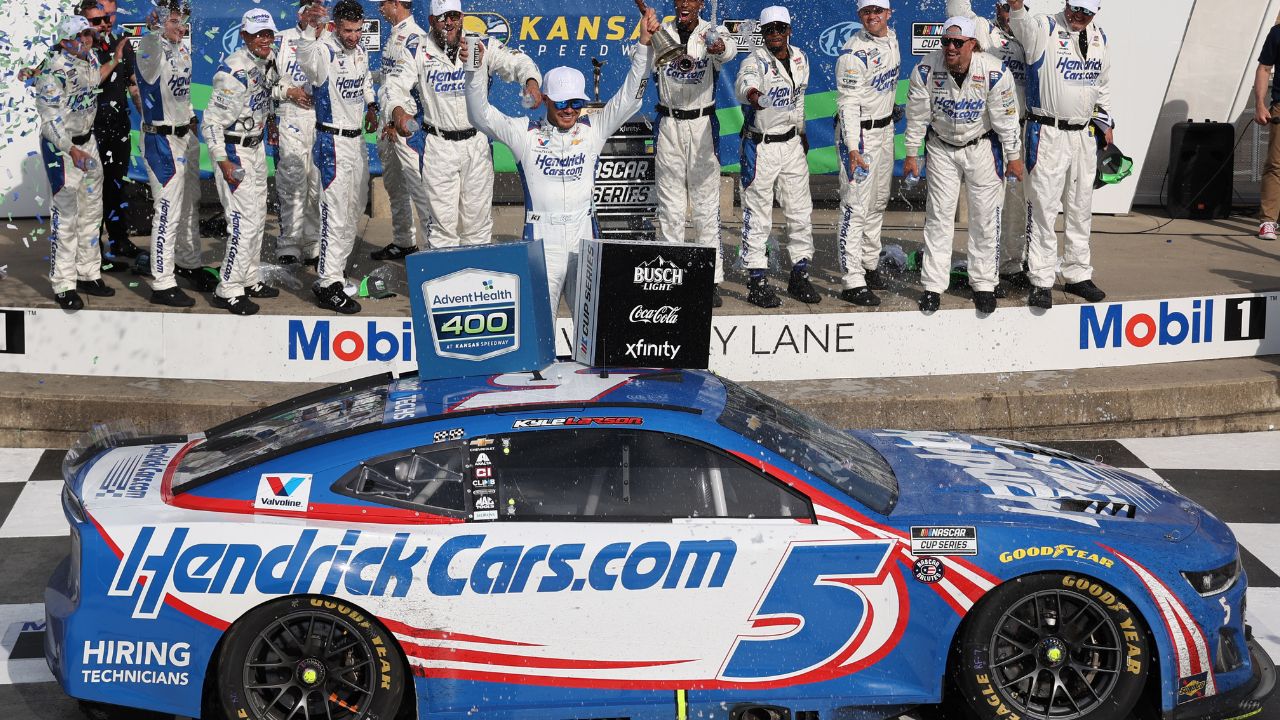 The team of NASCAR Cup Series driver Kyle Larson (5) celebrate a win at the AdventHealth 400 at Kansas Speedway.