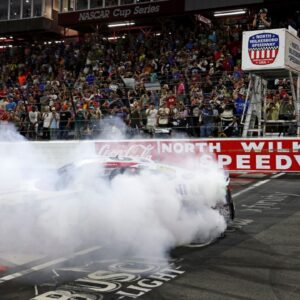North Wilkesboro, North Carolina, USA; NASCAR Cup Series driver Christopher Bell (20) celebrates winning the NASCAR All-Star Race at North Wilkesboro Speedway.