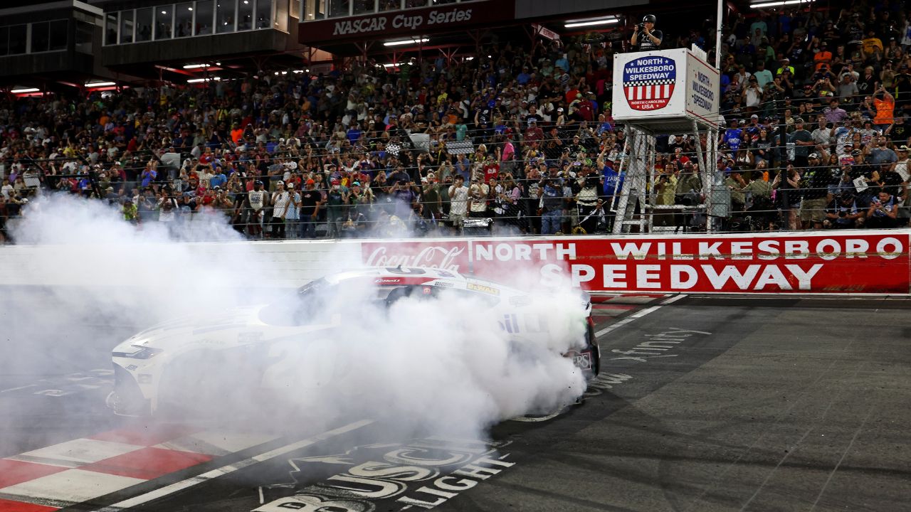 North Wilkesboro, North Carolina, USA; NASCAR Cup Series driver Christopher Bell (20) celebrates winning the NASCAR All-Star Race at North Wilkesboro Speedway.