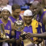 June 12, 2002; East Rutherford, NJ, USA; (left to right) Los Angeles Lakers Kobe Bryant, Lindsay Hunter and Shaquille O'Neal hold championship trophies after winning Game 4 of the NBA Finals at The Meadowlands. Mandatory Credit: Robert Deutsch-Imagn Images
