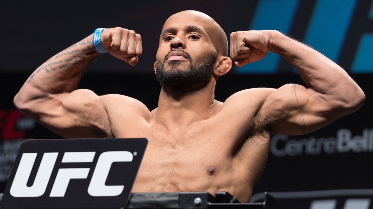 (L-R) Flyweight champion DEMETRIOUS Mighty Mouse JOHNSON makes weigh during the UFC 186 weigh-in at Metropolis on April 24, 2015 in Montreal, Canada