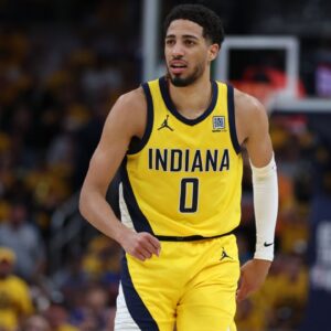 May 27, 2025; Indianapolis, Indiana, USA; Indiana Pacers guard Tyrese Haliburton (0) reacts after shooting a three point basket during the second quarter against the New York Knicks of game four of the eastern conference finals for the 2025 NBA Playoffs at Gainbridge Fieldhouse. Mandatory Credit: Trevor Ruszkowski-Imagn Images