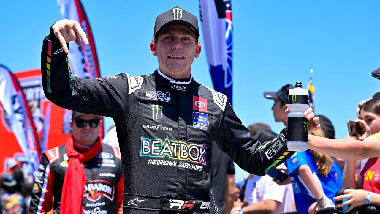 NASCAR Cup Series driver Riley Herbst (35) flashes the horns down for the University of Texas fans as he is introduced before the start of the Wurth 400 race at Texas Motor Speedway.