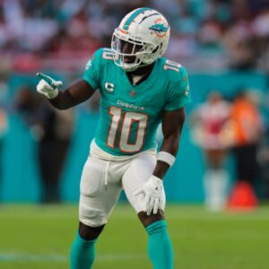 Miami Dolphins wide receiver Tyreek Hill (10) signals from the line of scrimmage against the San Francisco 49ers during the second quarter at Hard Rock Stadium.