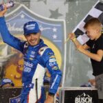 NASCAR Cup Series driver Kyle Larson (5) and his son Owen after winning the Bass Pro Shops Night Race at Bristol Motor Speedway.