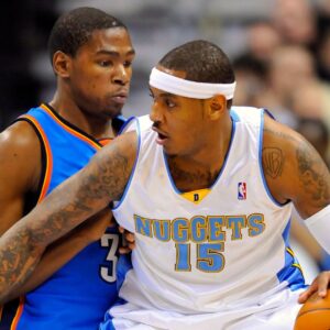 Dec 14, 2009; Denver, CO, USA; Oklahoma City Thunder forward Kevin Durant guards Denver Nuggets forward Carmelo Anthony (15) in the second half at the Pepsi Center.