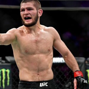 ; Khabib Nurmagomedov (red gloves) reacts after his fight against Conor McGregor (blue gloves) during UFC 229 at T-Mobile Arena.