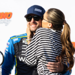 Ryan Blaney (12) gets a kiss from fiancé Gianna Tulio after winning the NASCAR Cup Series on July 14, 2024