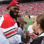 LeBron James talks to fans prior to the NCAA football game between the Ohio State Buckeyes and Notre Dame Fighting Irish at Ohio Stadium.