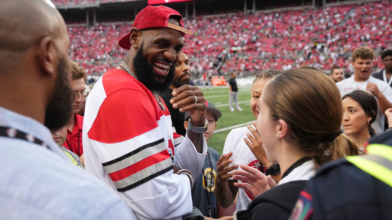LeBron James talks to fans prior to the NCAA football game between the Ohio State Buckeyes and Notre Dame Fighting Irish at Ohio Stadium.