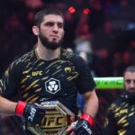 ; Islam Makhachev (red gloves) reacts after defeating Renato Moicano (not pictured) in a lightweight title fight during UFC 311 at Intuit Dome.
